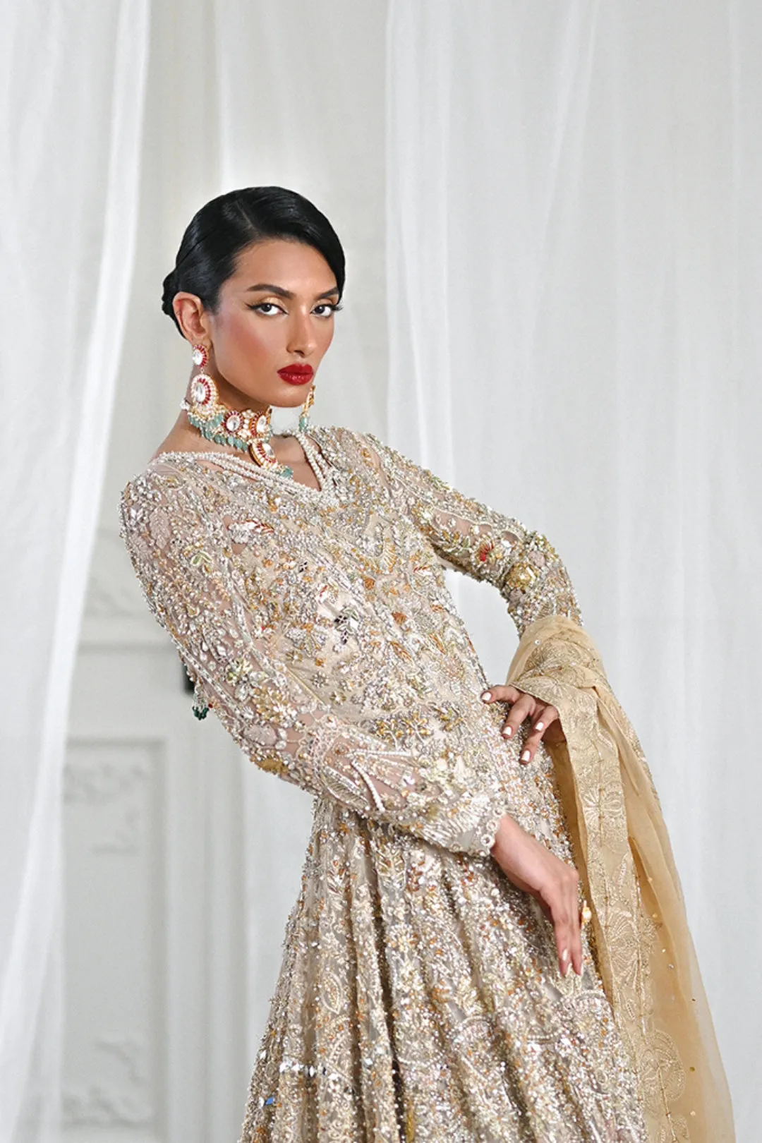 Golden Pakistani Bridal Outfit in Gown Lehenga Style