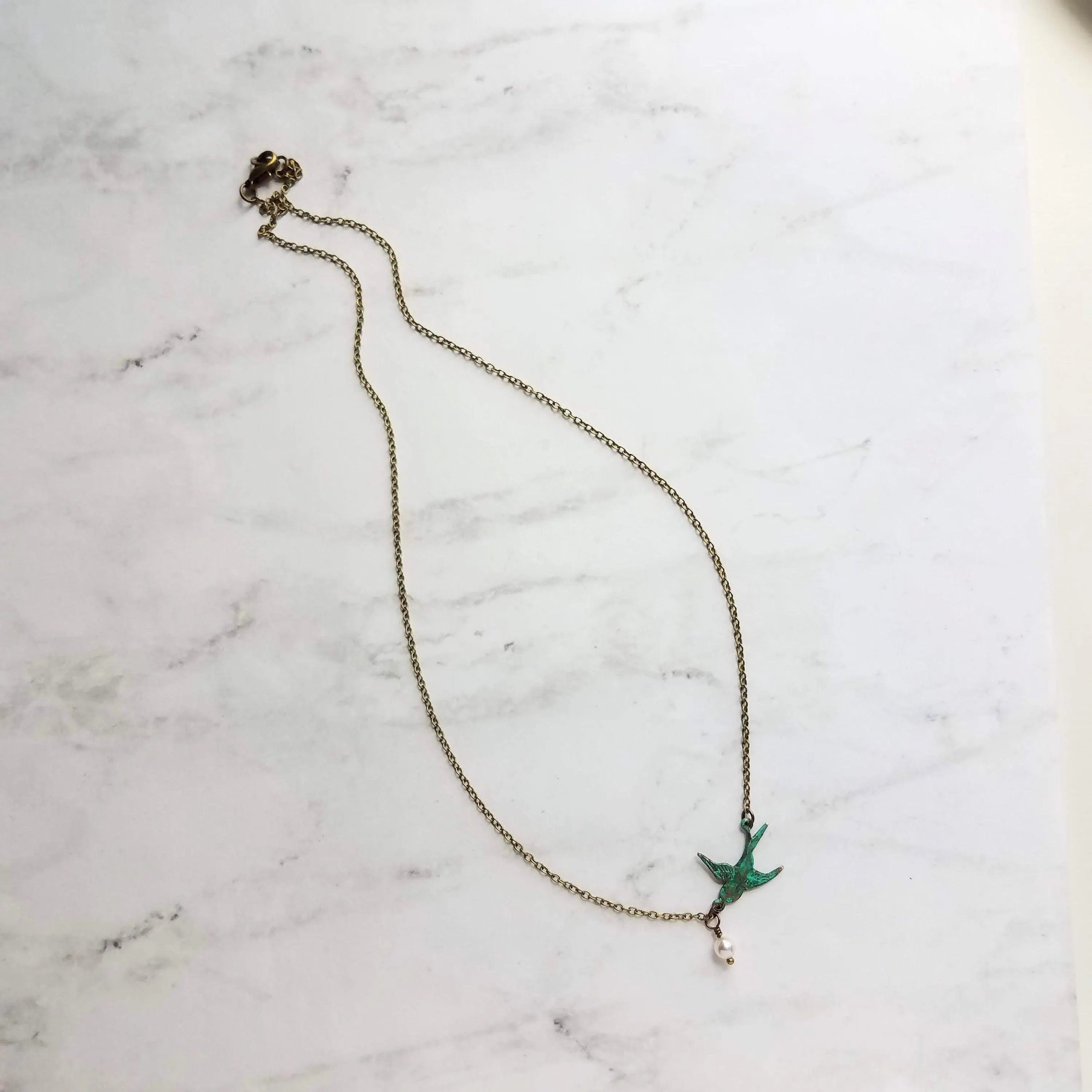 Little Bird Necklace, verdigris patina, antique brass chain, bronze necklace, blue green patina, flying bird necklace, pearl necklace, small