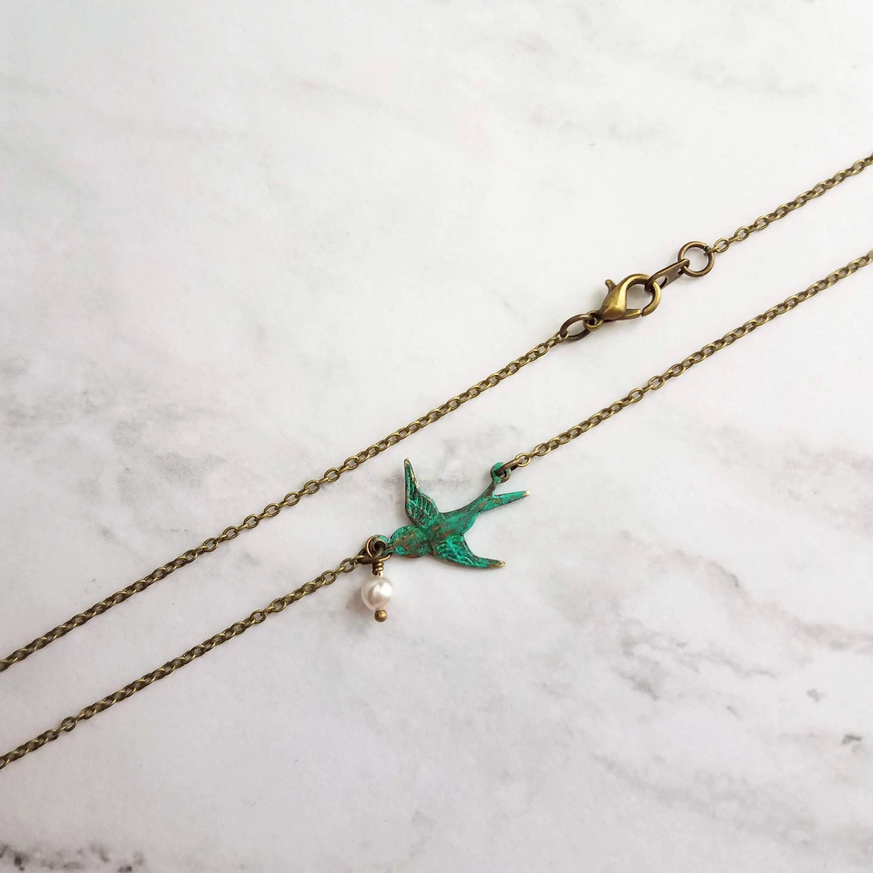 Little Bird Necklace, verdigris patina, antique brass chain, bronze necklace, blue green patina, flying bird necklace, pearl necklace, small