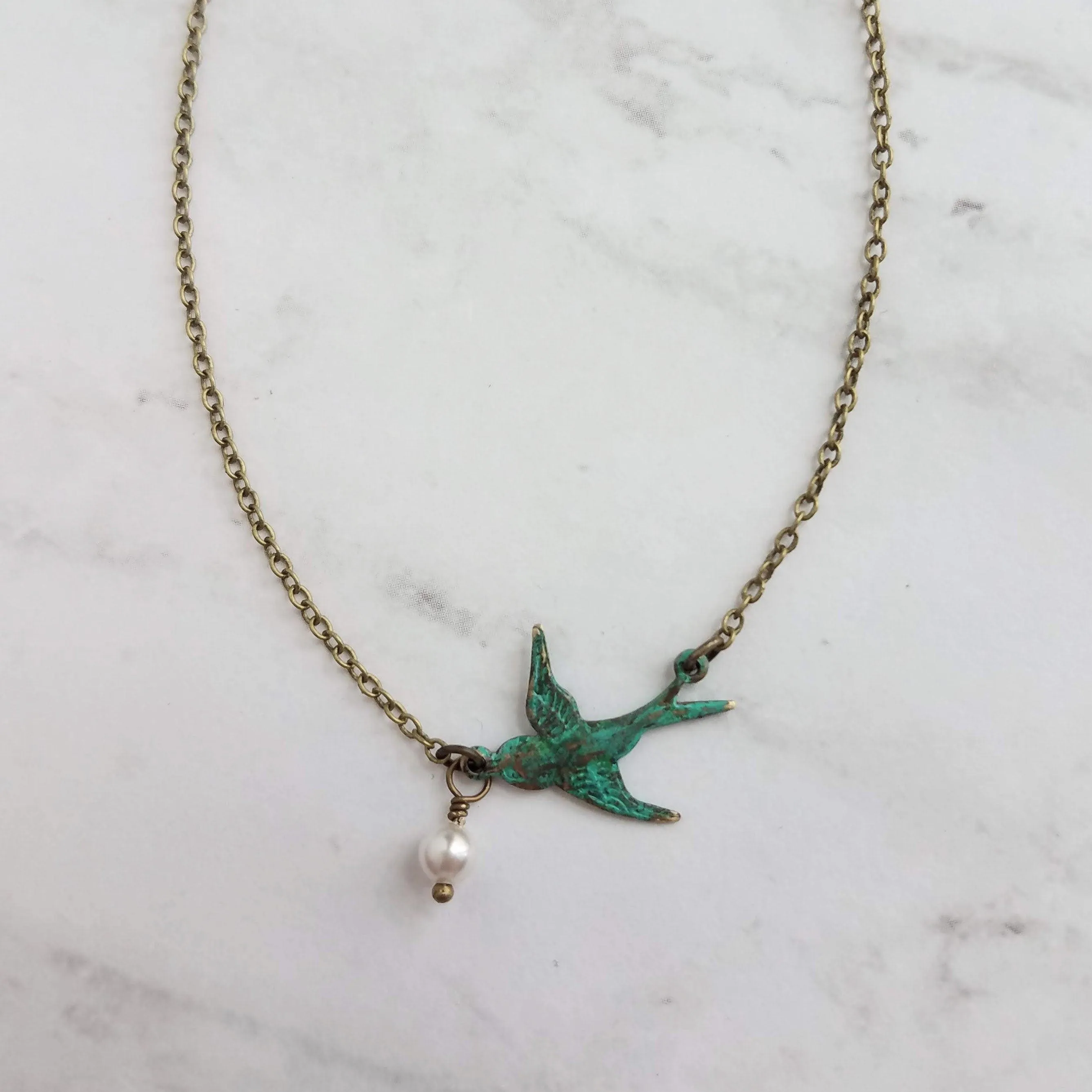 Little Bird Necklace, verdigris patina, antique brass chain, bronze necklace, blue green patina, flying bird necklace, pearl necklace, small