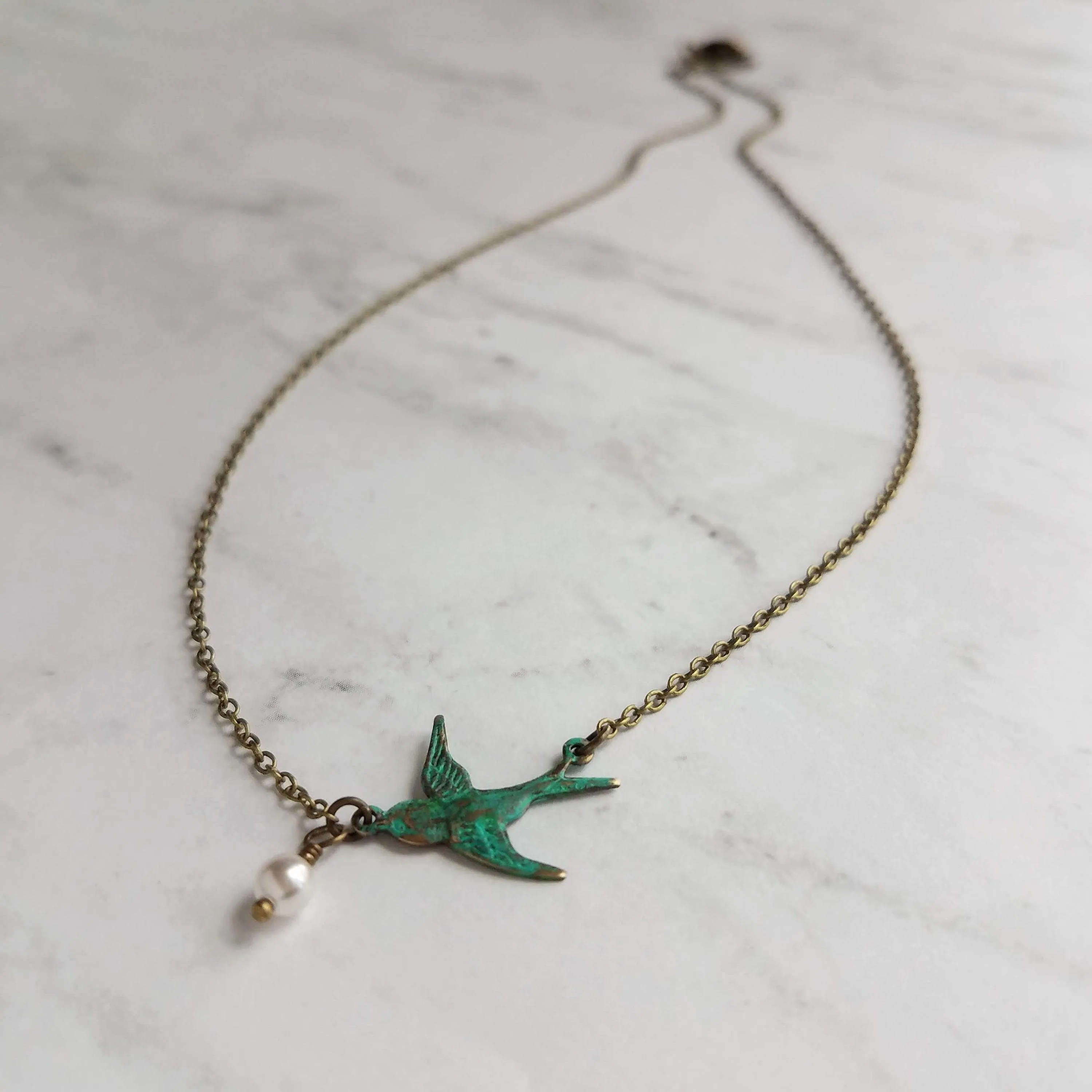 Little Bird Necklace, verdigris patina, antique brass chain, bronze necklace, blue green patina, flying bird necklace, pearl necklace, small