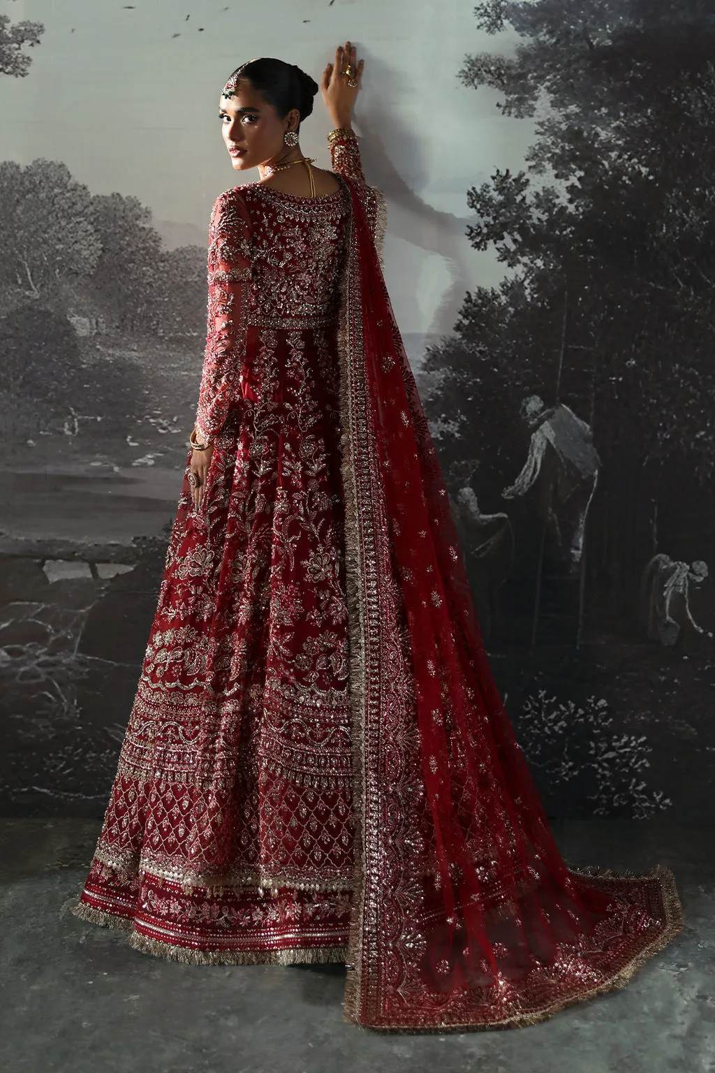 Red Pakistani Bridal Dress in Peshwas and Lehenga Style