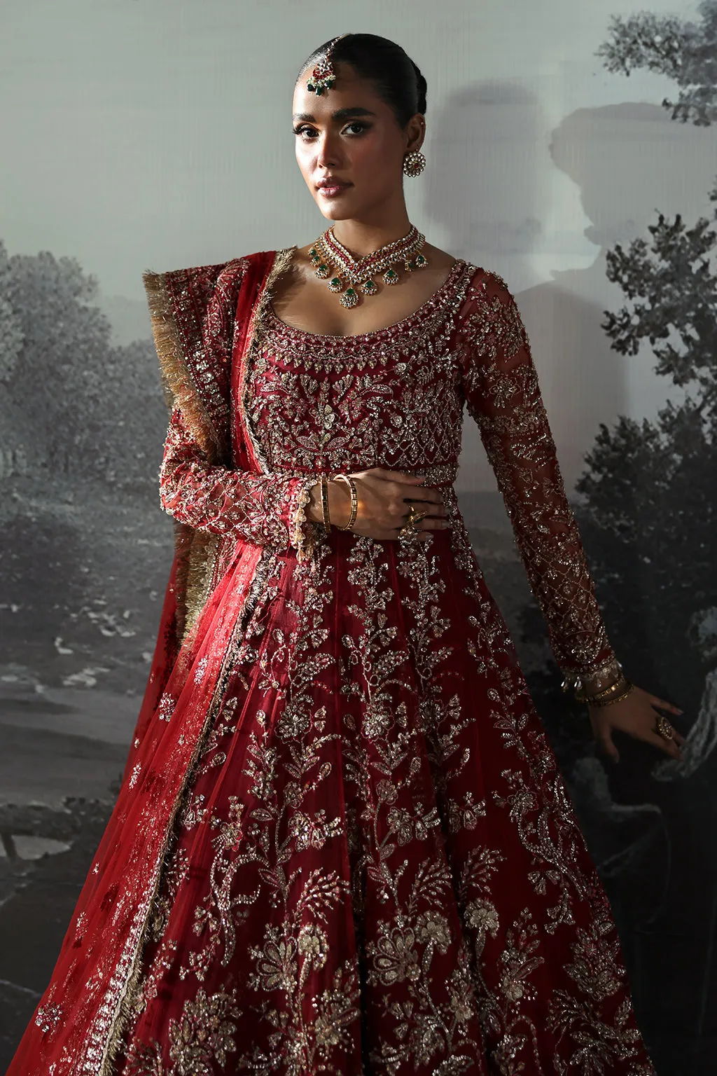 Red Pakistani Bridal Dress in Peshwas and Lehenga Style