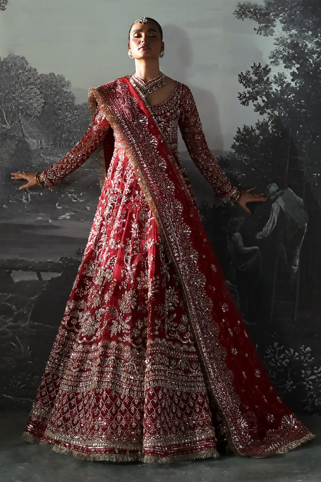 Red Pakistani Bridal Dress in Peshwas and Lehenga Style